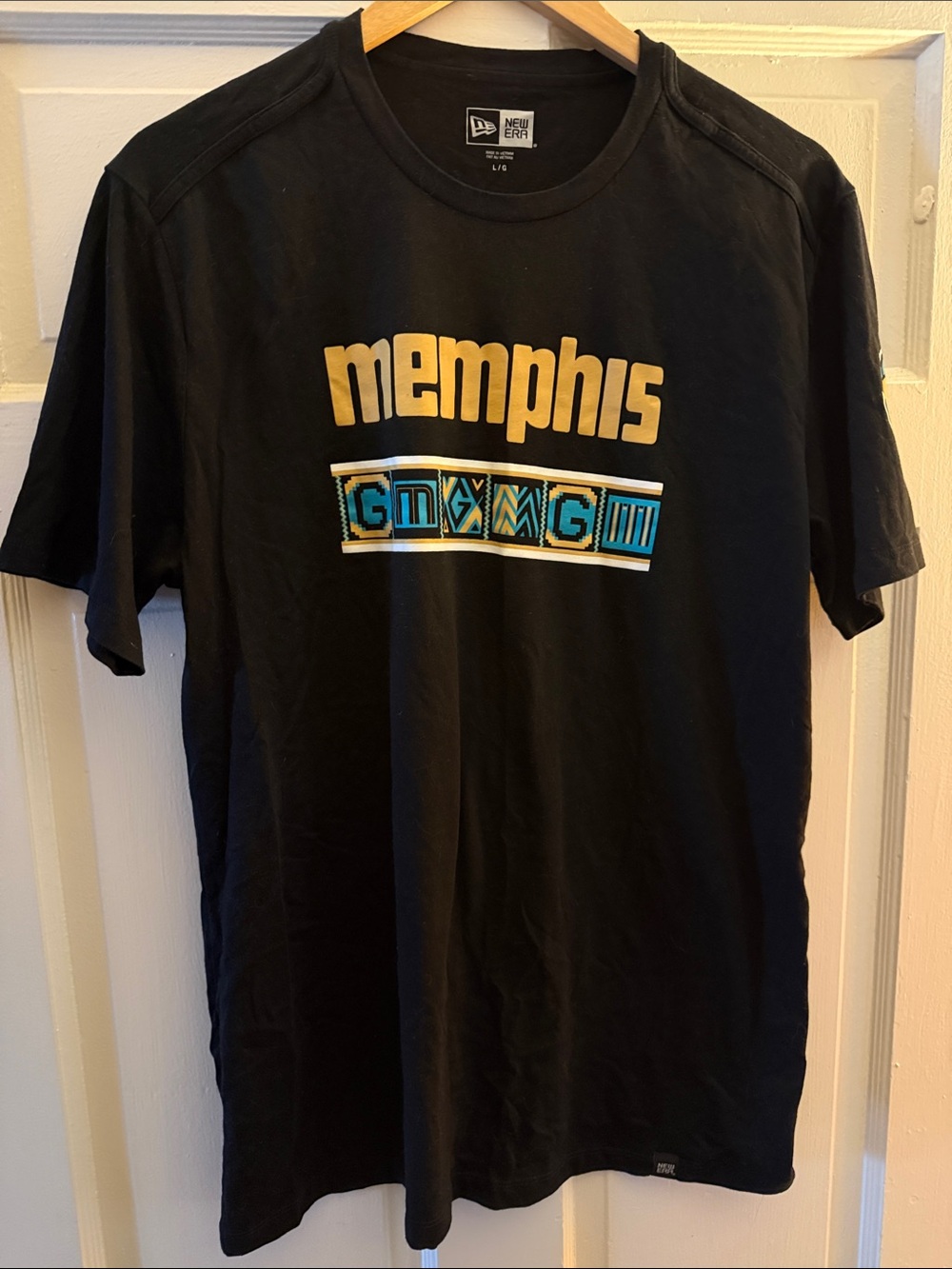 New Era Black Memphis Grizzlies Graphic Tee with Gold & Teal Accents
